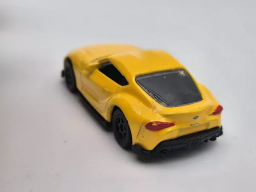 Toyota Supra - yellow - Welly - 1:64