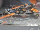 McLaren F1 set - #4 Lando Norris - 2023 British GP - 2023 Singapore GP - 2023 Monaco GP - 2022 Abu Dhabi - Bburago - 1:43