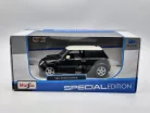 Mini Cooper (2006) - dark green - Maisto - 1:24