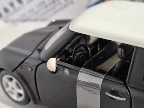 Mini Cooper (2006) - black - Maisto - 1:24