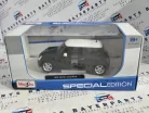 Mini Cooper (2006) - black - Maisto - 1:24